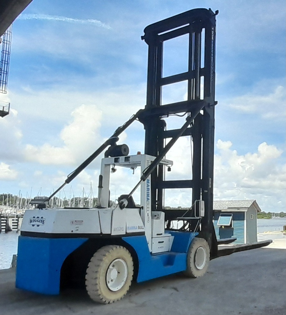Taylor TMH125 Marine forklift for sale 25000 capacity 30' used to hoist boats and Travel lift into Wiggins dry storage racks at boat yards and marinas.