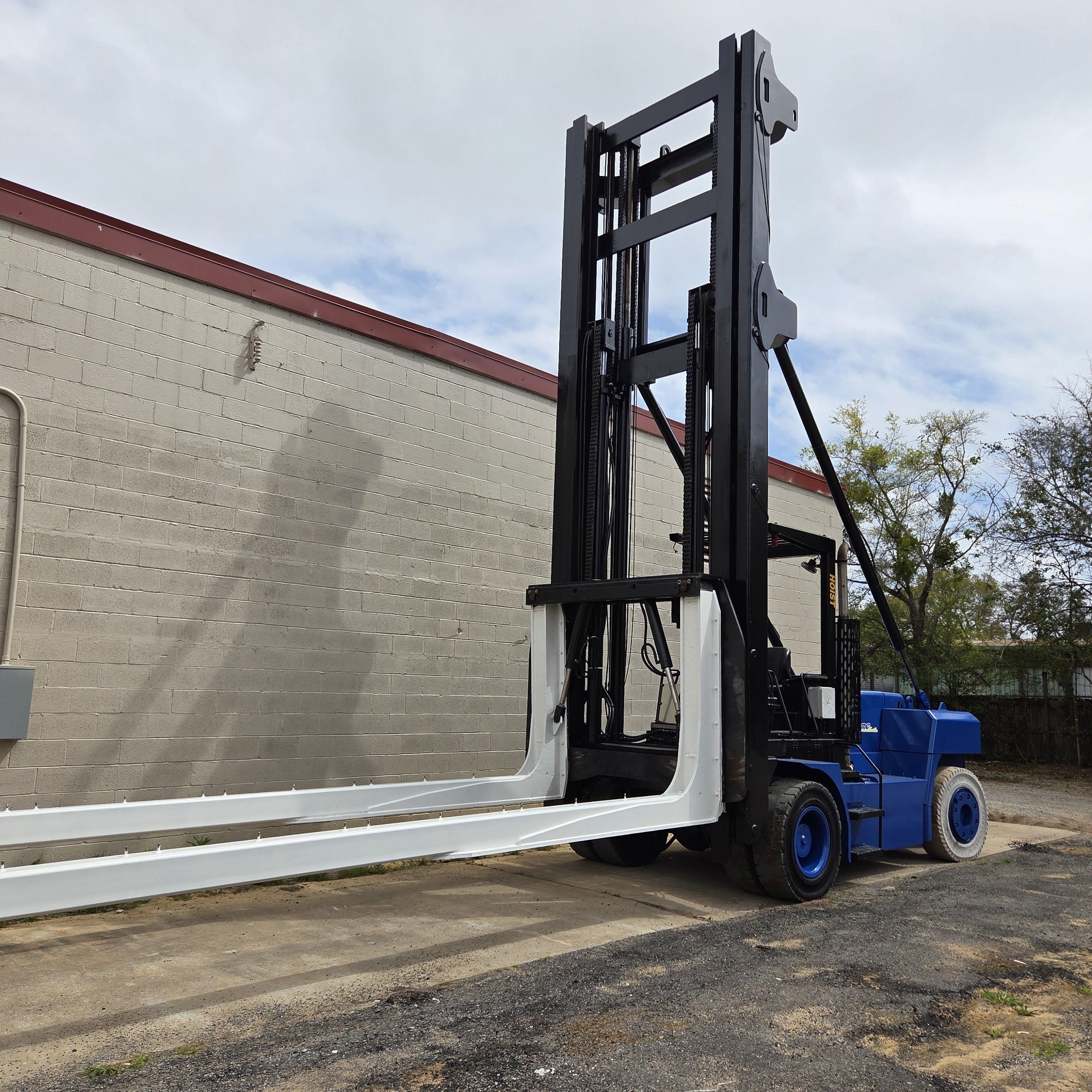 Travelift Marine forklift for sale 15000 capacity 30' used to hoist boats and Travel lift into Wiggins dry storage racks at boat yards and marinas.